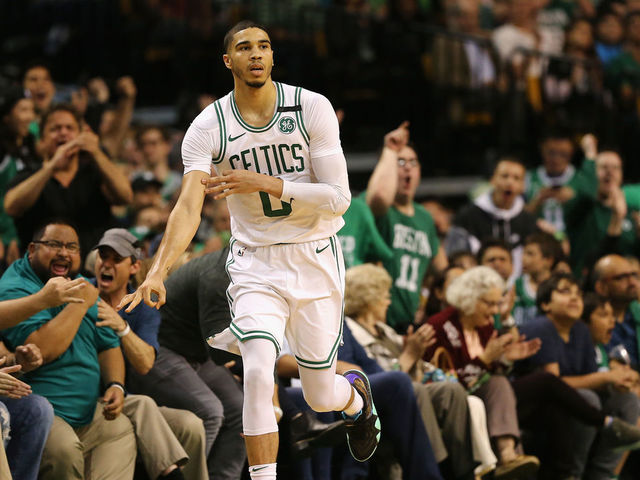 BOSTON, MA - MAY 15: Jayson Tatum #0 of the Boston Celtics reacts after making a basket in the first half against the Cleveland Cavaliers during Game Two of the 2018 NBA Eastern Conference Finals at TD Garden on May 15, 2018 in Boston, Massachusetts.