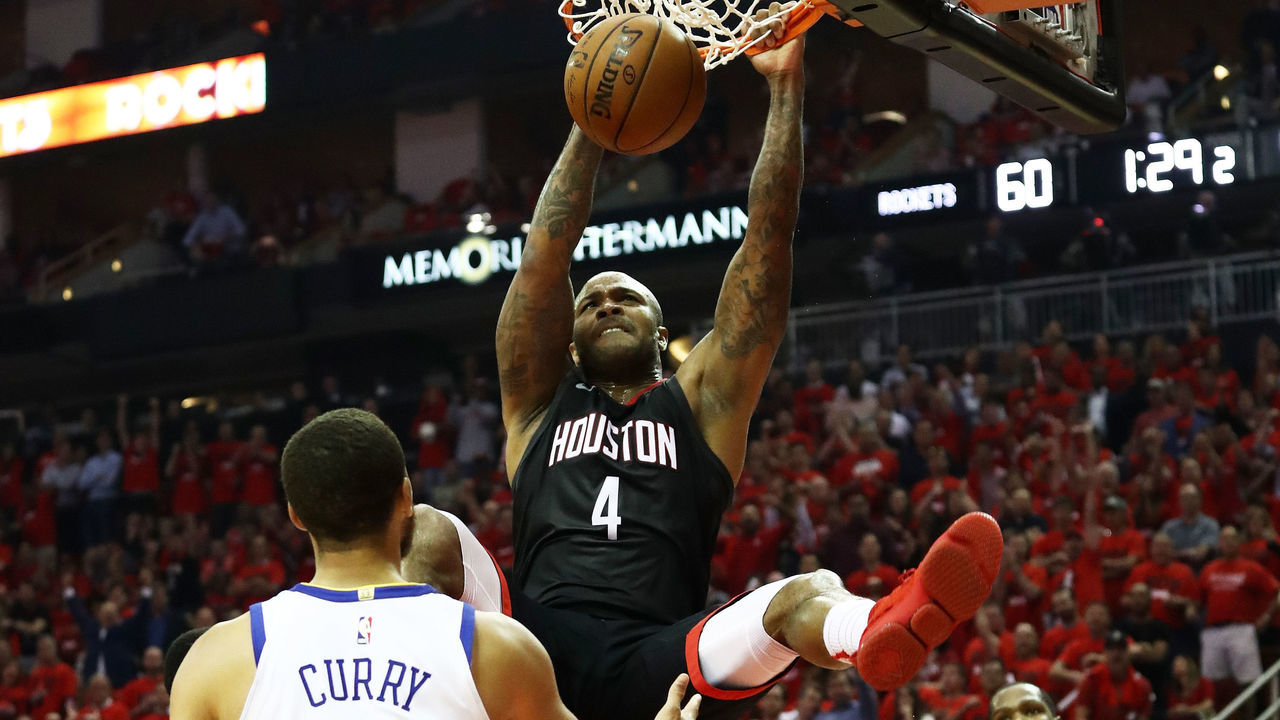 HOUSTON, TX - MAY 16: PJ Tucker #4 of the Houston Rockets dunks against the Golden State Warriors in the first half of Game Two of the Western Conference Finals of the 2018 NBA Playoffs at Toyota Center on May 16, 2018 in Houston, Texas.