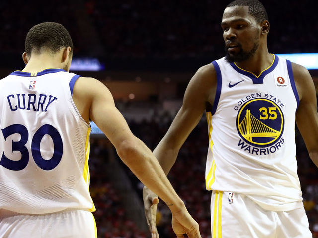 HOUSTON, TX - MAY 14: Kevin Durant #35 and Stephen Curry #30 of the Golden State Warriors react after a play in the third quarter against the Houston Rockets in Game One of the Western Conference Finals of the 2018 NBA Playoffs at Toyota Center on May 14, 2018 in Houston, Texas.