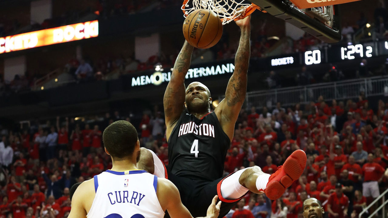 HOUSTON, TX - MAY 16: PJ Tucker #4 of the Houston Rockets dunks against the Golden State Warriors in the first half of Game Two of the Western Conference Finals of the 2018 NBA Playoffs at Toyota Center on May 16, 2018 in Houston, Texas.