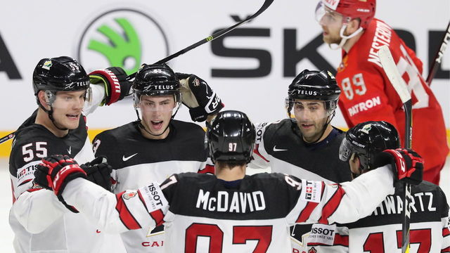 COPENHAGEN, DENMARK - MAY 17, 2018: Canada's Colton Parayko, Ryan Nugent-Hopkins, Connor McDavid, Jordan Eberle, and Jaden Schwartz (L-R front) celebrate scoring in the 2018 IIHF Ice Hockey World Championship Quarterfinal match against Russia at Royal Arena. Anton Novoderezhkin/TASS