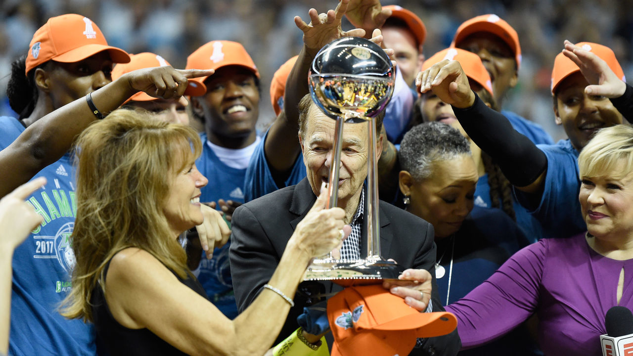 MINNEAPOLIS, MN - OCTOBER 04: Owner Glen Taylor of the Minnesota Lynx and wife, Becky, are handed the Championship Trophy after defeating the against the Los Angeles Sparks in Game Five of the WNBA Finals on October 4, 2017 at Williams in Minneapolis, Minnesota. The Lynx defeated the Sparks 85-76 to win the championship.