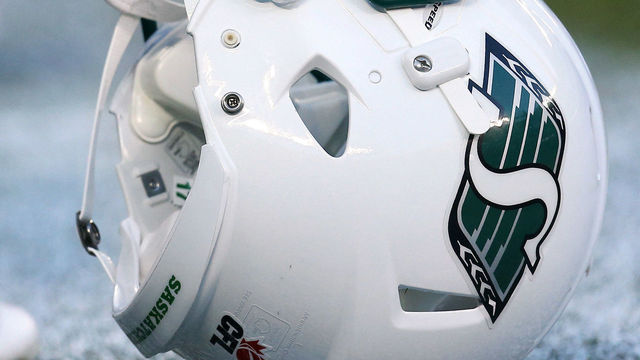 TORONTO, CANADA - JULY 11: Ricky Schmitt #17 of the Saskatchewan Roughriders leans on his helmet during CFL game action against the Toronto Argonauts on July 11, 2013 at Rogers Centre in Toronto, Ontario, Canada.
