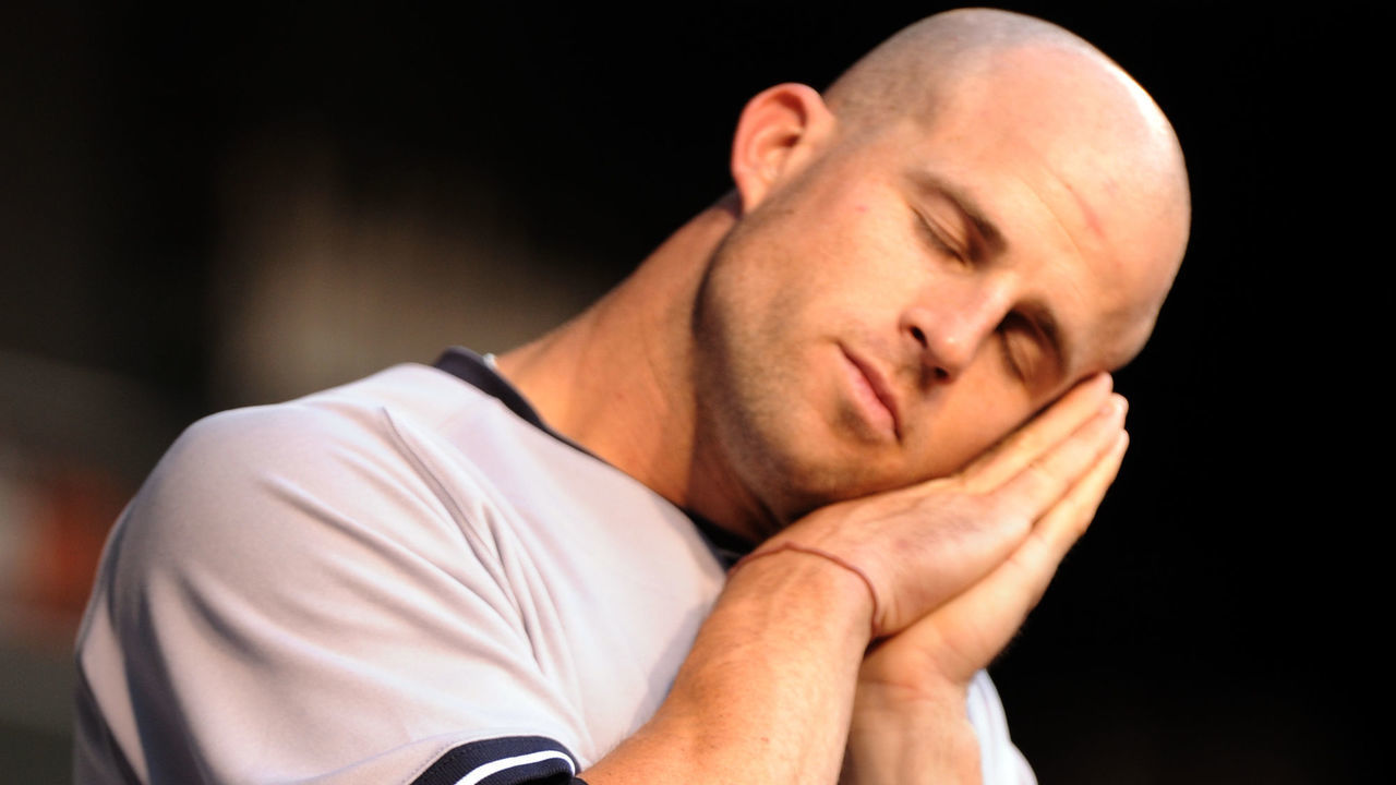 BALTIMORE, MD - AUGUST 28: Brett Gardner #11 of the New York Yankees takes a mock nap before a baseball game against the Baltimore Orioles at Oriole Park at Camden Yards on August 28, 2011 in Baltimore, Maryland.