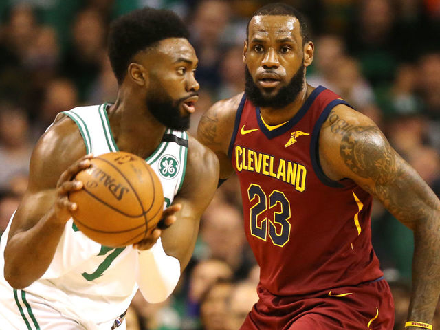 BOSTON, MA - MAY 13: LeBron James #23 of the Cleveland Cavaliers defends Jaylen Brown #7 of the Boston Celtics during the first quarter in Game One of the Eastern Conference Finals of the 2018 NBA Playoffs at TD Garden on May 13, 2018 in Boston, Massachusetts.