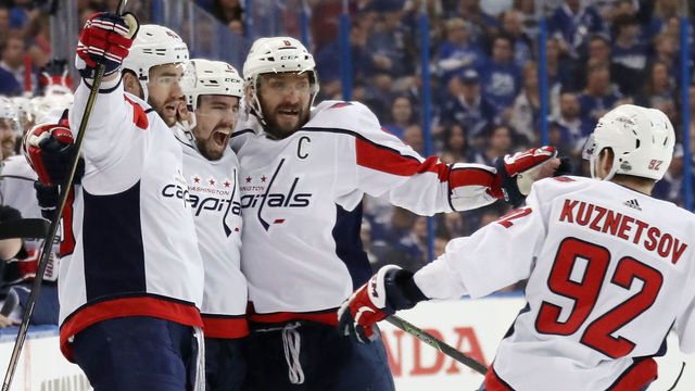 TAMPA, FL - MAY 13: Tom Wilson #43 of the Washington Capitals celebrates his first period goal with Matt Niskanen #2 and Alex Ovechkin #8 against the Tampa Bay Lightning in Game Two of the Eastern Conference Finals during the 2018 NHL Stanley Cup Playoffs at the Amalie Arena on May 13, 2018 in Tampa, Florida. The Capitals defeated the Lightning 6-2.