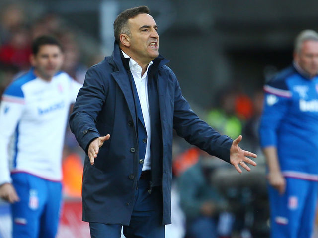 Swansea City's Portuguese manager Carlos Carvalhal gestures during the English Premier League football match between Swansea City and Stoke City at The Liberty Stadium in Swansea, south Wales on May 13, 2018.