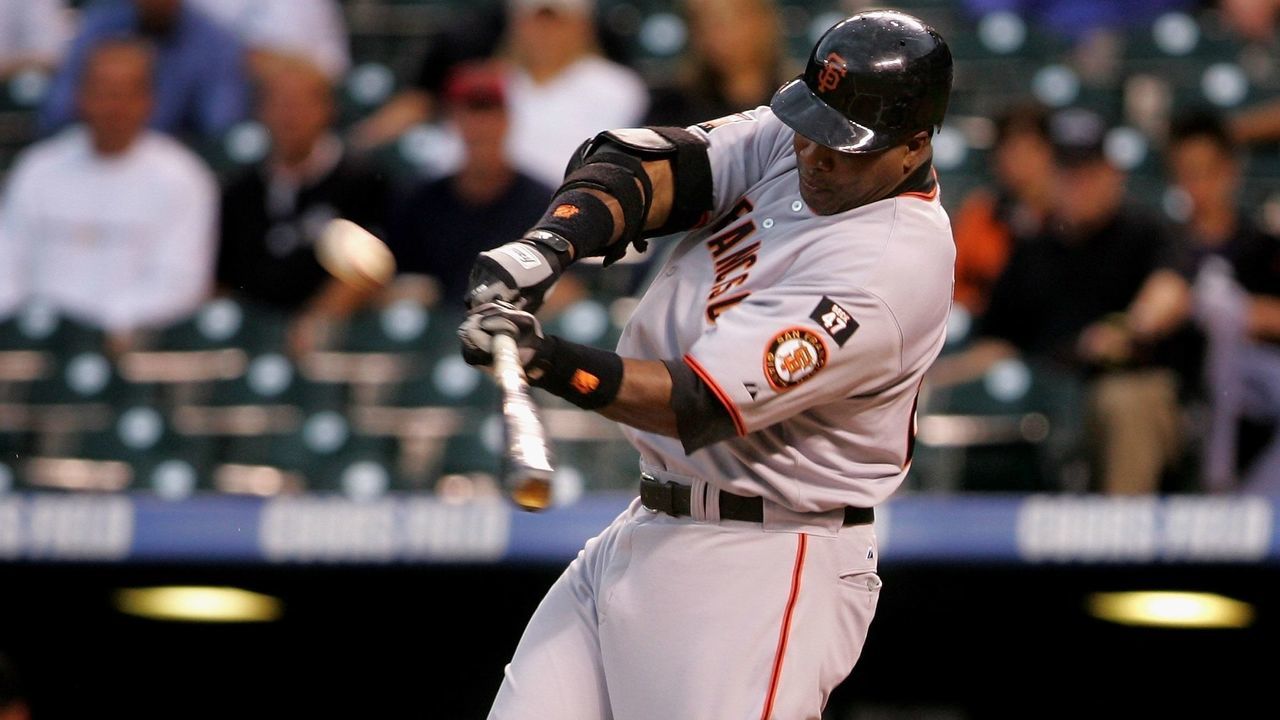 DENVER - SEPTEMBER 05: Barry Bonds #25 of the San Francisco Giants launches his 762nd career home run off of Ubaldo Jimenez of the Colorado Rockies in the first inning to give the Giants a 2-0 lead over the Rockies at Coors Field on September 5, 2007 in Denver, Colorado.