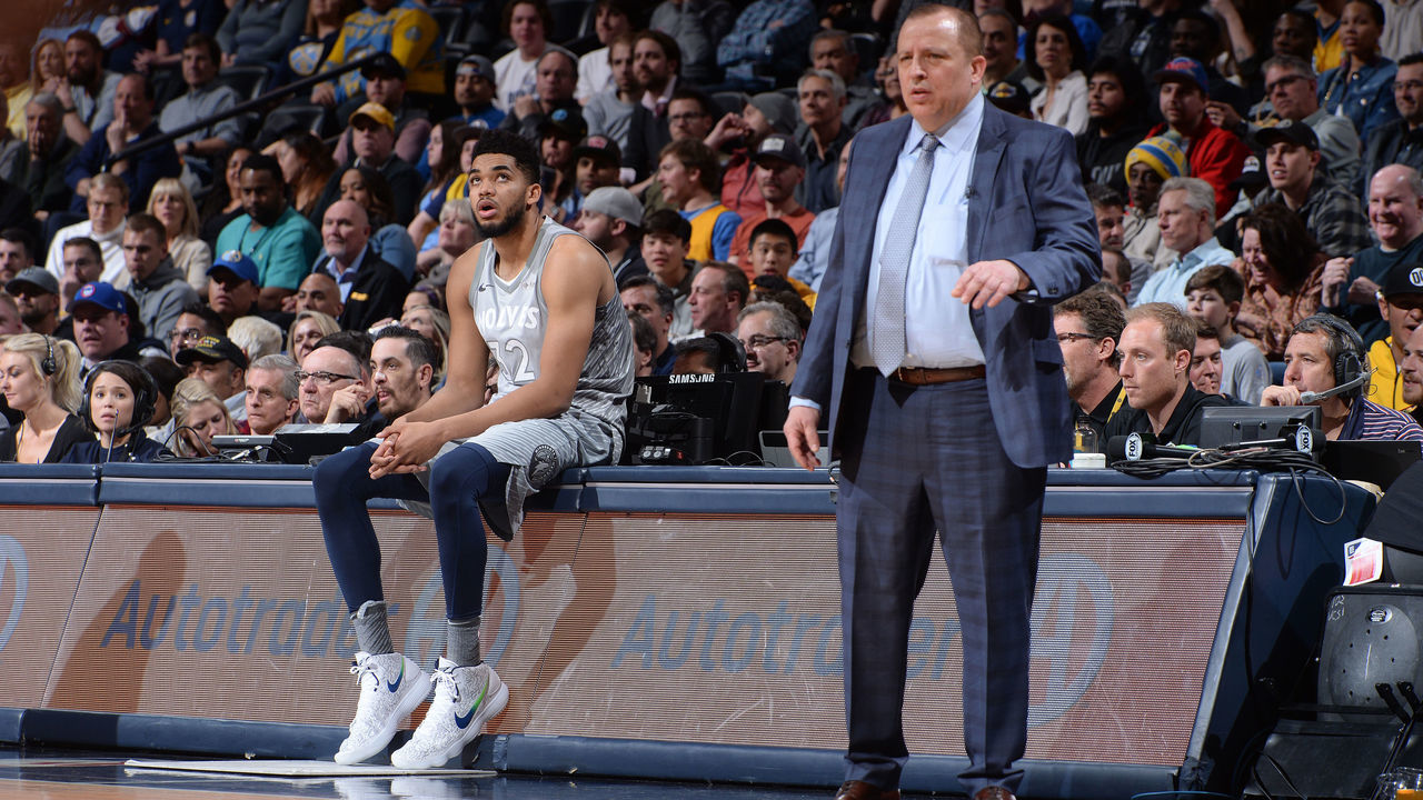 DENVER, CO - APRIL 5: Tom Thibodeau and Karl-Anthony Towns #32 of the Minnesota Timberwolves look on during the game against the Denver Nuggets on April 5, 2018 at the Pepsi Center in Denver, Colorado. NOTE TO USER: User expressly acknowledges and agrees that, by downloading and/or using this Photograph, user is consenting to the terms and conditions of the Getty Images License Agreement. Mandatory Copyright Notice: Copyright 2018 NBAE