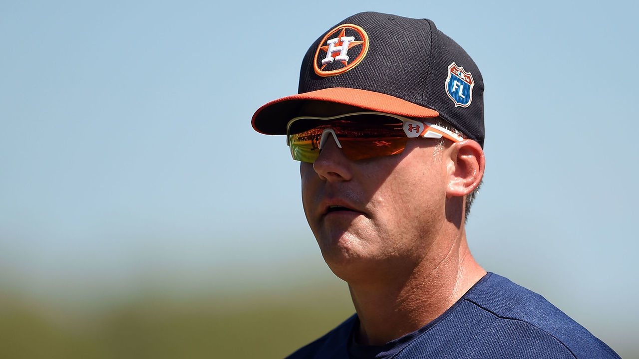 KISSIMMEE, FL - MARCH 15: Manager A.J. Hinch #14 of the Houston Astros walks to the dugout prior to a spring training game against the Washington Nationals at Osceola County Stadium on March 15, 2016 in Kissimmee, Florida.