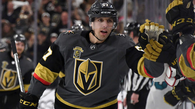 LAS VEGAS, NV - MAY 04: David Perron #57 of the Vegas Golden Knights celebrates with teammates on the bench after he assisted James Neal #18 on a goal against the San Jose Sharks with three seconds left in the first period of Game Five of the Western Conference Second Round during the 2018 NHL Stanley Cup Playoffs at T-Mobile Arena on May 4, 2018 in Las Vegas, Nevada.