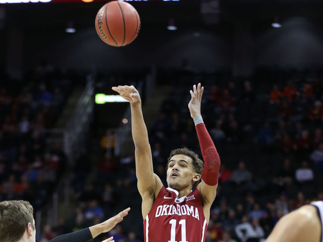 KANSAS CITY, MO - MARCH 07: Oklahoma Sooners guard Trae Young (11) shoots a three in the first half of a first round matchup in the Big 12 Basketball Championship between the Oklahoma Sooners and Oklahoma State Cowboys on March 7, 2018 at Sprint Center in Kansas City, MO.