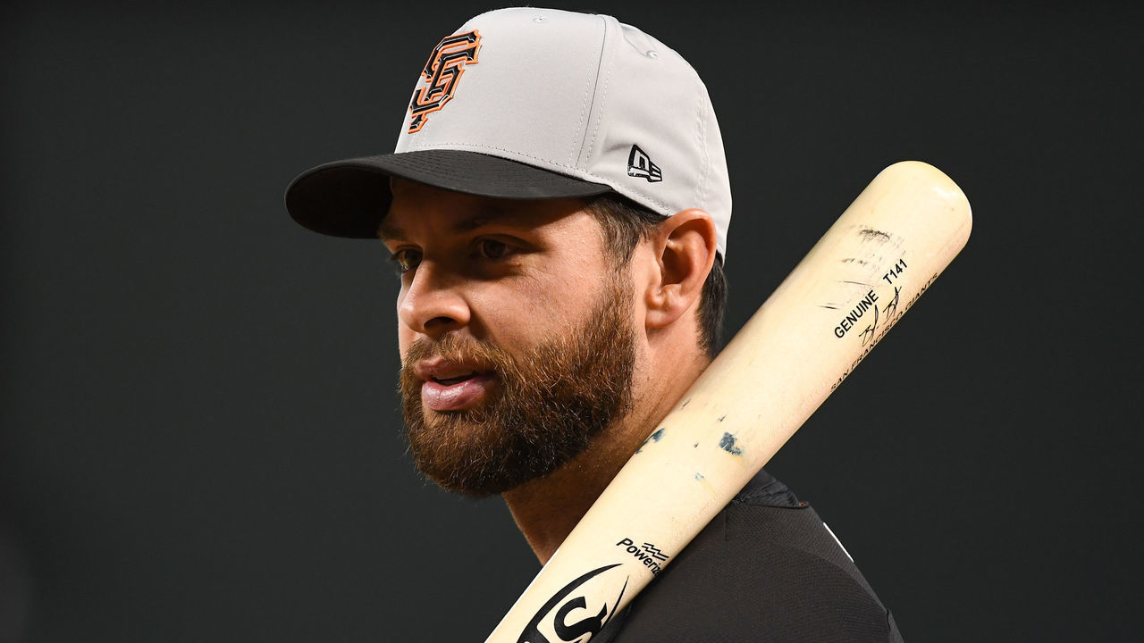 PHOENIX, AZ - APRIL 19: Brandon Belt #9 of the San Francisco Giants looks on during batting practice prior to the MLB game against the Arizona Diamondbacks at Chase Field on April 19, 2018 in Phoenix, Arizona.