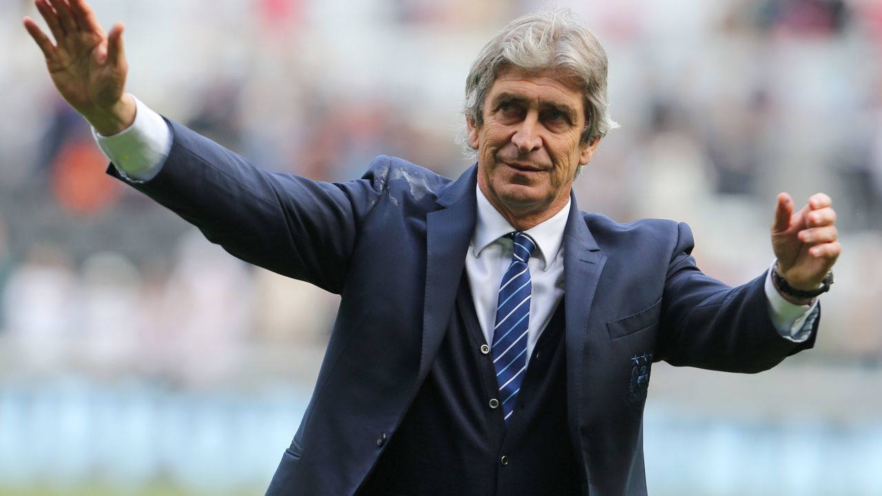 Manchester City's Chilean manager Manuel Pellegrini waves to supporters after the English Premier League football match between Swansea City and Manchester City at The Liberty Stadium in Swansea, south Wales on May 15, 2016. The game finished 1-1. / AFP / GEOFF CADDICK /