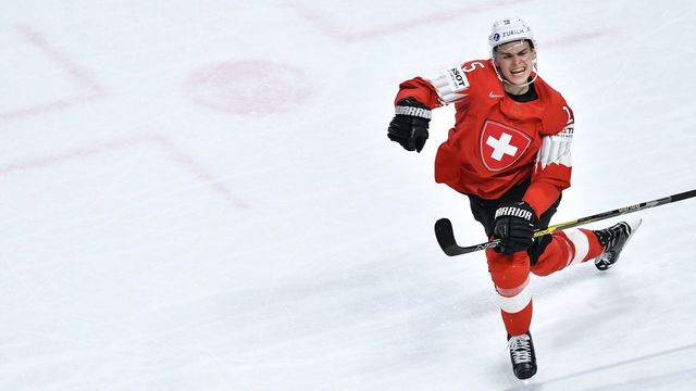 Switzerland's Gregory Hofmann celebrates scoring during the semifinal match Canada vs Switzerland of the 2018 IIHF Ice Hockey World Championship at the Royal Arena in Copenhagen, Denmark, on May 19, 2018.