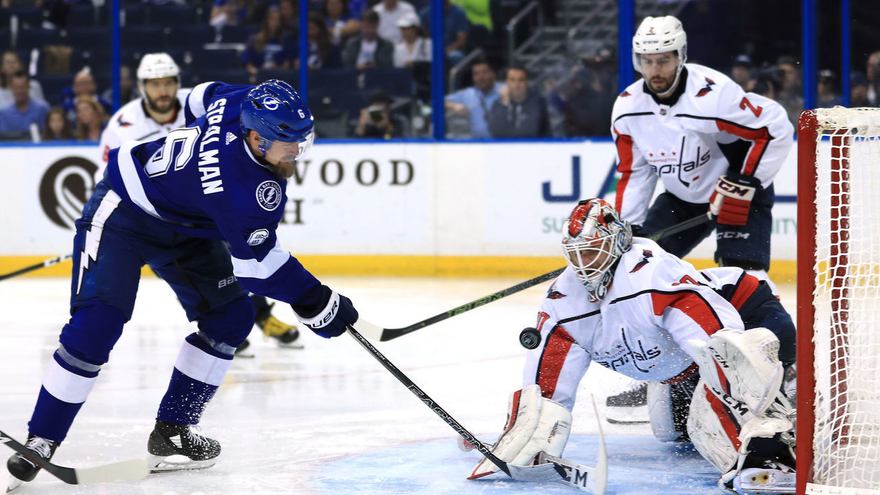 TAMPA, FL - MAY 19: Anton Stralman #6 of the Tampa Bay Lightning takes a shot on Braden Holtby #70 of the Washington Capitals during the second period in Game Five of the Eastern Conference Finals during the 2018 NHL Stanley Cup Playoffs at Amalie Arena on May 19, 2018 in Tampa, Florida.