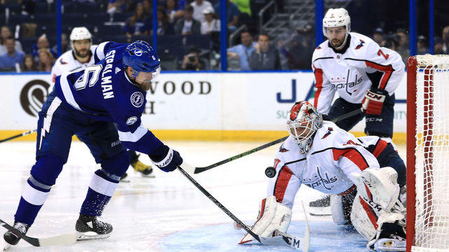 TAMPA, FL - MAY 19: Anton Stralman #6 of the Tampa Bay Lightning takes a shot on Braden Holtby #70 of the Washington Capitals during the second period in Game Five of the Eastern Conference Finals during the 2018 NHL Stanley Cup Playoffs at Amalie Arena on May 19, 2018 in Tampa, Florida.