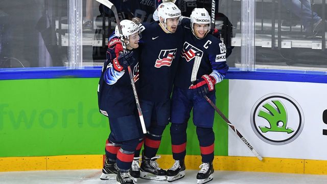 United States' Chris Kreider is congratulated by teammates after scoring during the bronze medal match USA vs Canada of the 2018 IIHF Ice Hockey World Championship at the Royal Arena in Copenhagen, Denmark, on May 20, 2018.