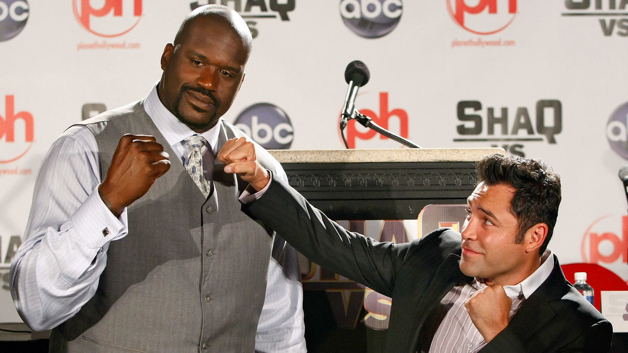 LAS VEGAS - AUGUST 18: Shaquille O' Neal (L) of the Cleveland Cavaliers and boxer Oscar De La Hoya pose as they tape a segment for the new ABC television series 'Shaq Vs.' at the Planet Hollywood Resort & Casino August 18, 2009 in Las Vegas, Nevada. The reality show, which launches tonight, follows O'Neal as he competes against star athletes in their respective sports.