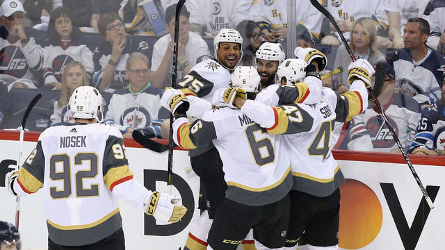 WINNIPEG, MB - MAY 20: Ryan Reaves #75 of the Vegas Golden Knights celebrates with teammates after scoring a second period goal against the Winnipeg Jets in Game Five of the Western Conference Finals during the 2018 NHL Stanley Cup Playoffs at Bell MTS Place on May 20, 2018 in Winnipeg, Canada.