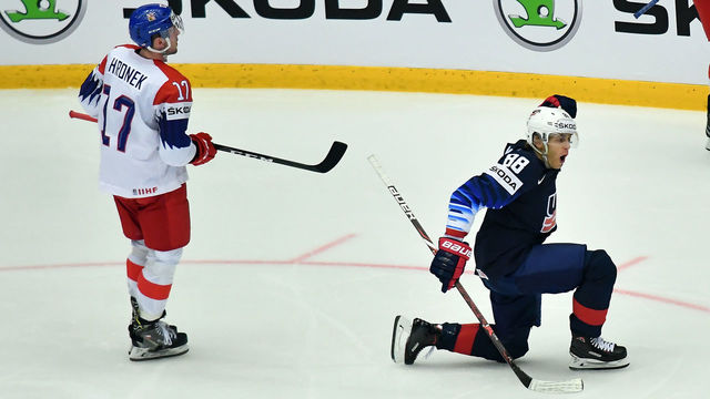 Patrick Kane (R) of the United States celebrates after scoring the third goal during the quarterfinal match United States vs Czech Republic of the 2018 IIHF Ice Hockey World Championship at the Jyske Bank Boxen in Herning, Denmark, on May 17, 2018.