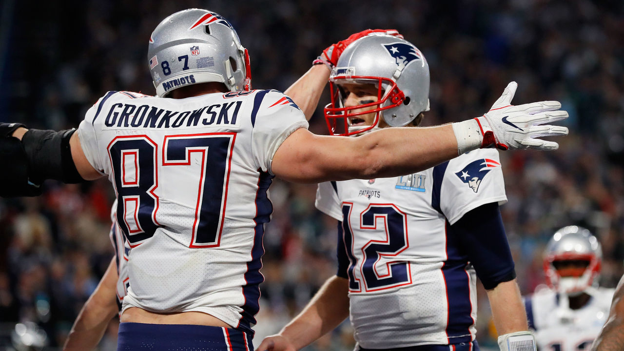 MINNEAPOLIS, MN - FEBRUARY 04: Rob Gronkowski #87 and Tom Brady #12 of the New England Patriots celebrate their 4-yard touchdown pass during the fourth quarter against the Philadelphia Eagles in Super Bowl LII at U.S. Bank Stadium on February 4, 2018 in Minneapolis, Minnesota.