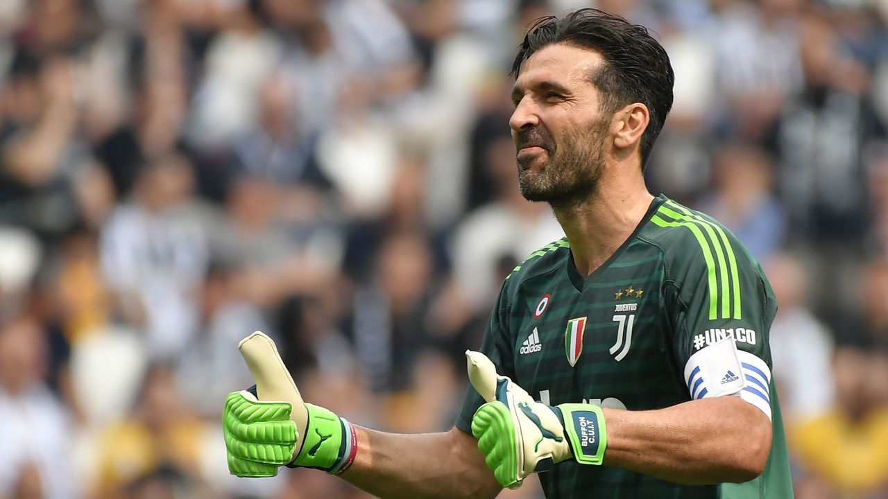 Juventus' goalkeeper Gianluigi Buffon greets fans during the Italian Serie A football match Juventus versus Verona, on May 19, 2018 at the Allianz Stadium in Turin. - Italy great Gianluigi Buffon takes his final bow in goal for Juventus today at the end of a 17-year stint with the Serie A champions.