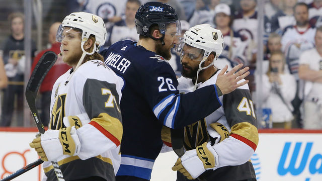 WINNIPEG, MB - MAY 20: Blake Wheeler #26 of the Winnipeg Jets talks with Pierre-Edouard Bellemare #41 of the Vegas Golden Knights after the Vegas Golden Knights defeated the Winnipeg Jets in Game Five of the Western Conference Finals during the 2018 NHL Stanley Cup Playoffs at Bell MTS Place on May 20, 2018 in Winnipeg, Canada.