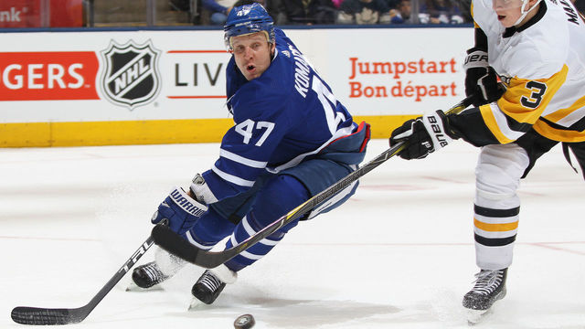 TORONTO, ON - MARCH 10: Olli Maatta #3 of the Pittsburgh Penguins tries to knock a puck away intended for Leo Komarov #47 of the Toronto Maple Leafs during an NHL game at the Air Canada Centre on March 10, 2018 in Toronto, Ontario, Canada.
