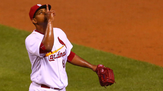 ST. LOUIS, MO - SEPTEMBER 29: Stater Alex Reyes #61 of the St. Louis Cardinals celebrates after recording the third out with the bases loaded against the Cincinnati Reds in the sixth inning at Busch Stadium on September 29, 2016 in St. Louis, Missouri.
