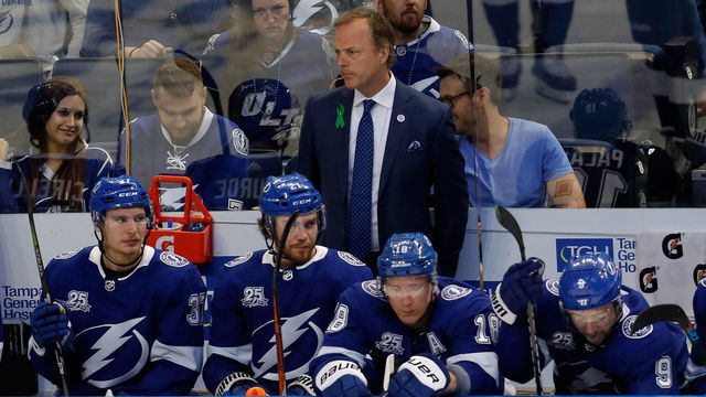 TAMPA, FL - MAY 11: Head Coach Jon Cooper of the Tampa Bay Lightning looks on against the Washington Capitals during the second period in Game One of the Eastern Conference Finals during the 2018 NHL Stanley Cup Playoffs at Amalie Arena on May 11, 2018 in Tampa, Florida.