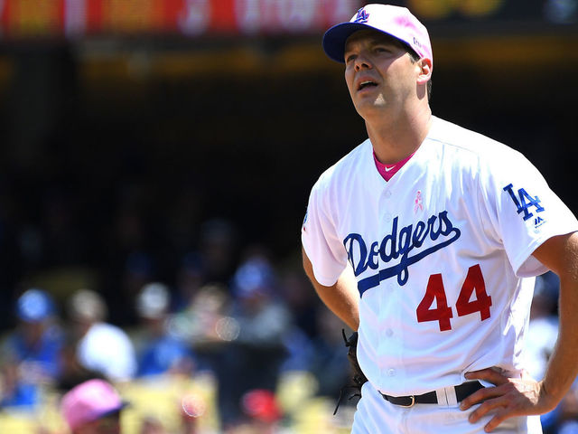 LOS ANGELES, CA - MAY 13: Rich Hill #44 of the Los Angeles Dodgers stands on the mound after allowing two runs in the third inning of the game against the Cincinnati Reds at Dodger Stadium on May 13, 2018 in Los Angeles, California.