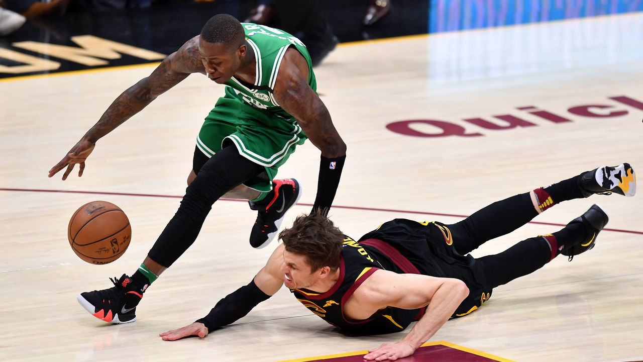 CLEVELAND, OH - MAY 21: Kyle Korver #26 of the Cleveland Cavaliers competes for a loose ball against Terry Rozier #12 of the Boston Celtics in the second half during Game Four of the 2018 NBA Eastern Conference Finals at Quicken Loans Arena on May 21, 2018 in Cleveland, Ohio.