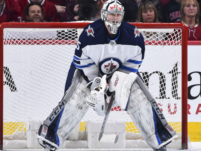 MONTREAL, QC - APRIL 03: Goaltender Steve Mason #35 of the Winnipeg Jets looks on as he protects his net against the Montreal Canadiens during the NHL game at the Bell Centre on April 3, 2018 in Montreal, Quebec, Canada. The Winnipeg Jets defeated the Montreal Canadiens 5-4 in overtime.