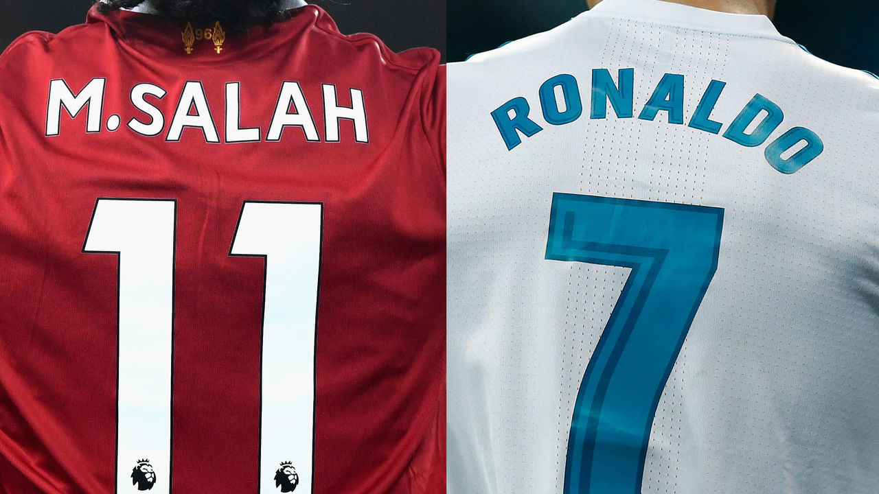 FILE PHOTO (EDITORS NOTE: COMPOSITE OF IMAGES - Image numbers 879097616 (L) and 917598122) In this composite image a comparision has been made between Mohamed Salah of Liverpool and Cristiano Ronaldo of Real Madrid CF. Real Madrid and Liverpool meet in the UEFA Champions League Final on May 26, 2018 at the NSC Olimpiyskiy Stadium in Kiev, Ukraine. ***LEFT IMAGE*** LIVERPOOL, ENGLAND - NOVEMBER 25: Mohamed Salah of Liverpool celebrates scoring his sides first goal during the Premier League match between Liverpool and Chelsea at Anfield on November 25, 2017 in Liverpool, England.