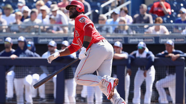 PEORIA, AZ - FEBRUARY 26: Chris Carter #31 of the Los Angeles Angels hits a double against the San Diego Padres during the second inning of the spring training game at Peoria Stadium on February 26, 2018 in Peoria, Arizona.