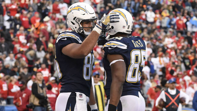 SAN DIEGO, CA - JANUARY 01: San Diego Chargers Tight End Hunter Henry (86) scores a touchdown and is congratulated by San Diego Chargers Tight End Antonio Gates (85) during the NFL Football game between the Kansas City Chiefs and the San Diego Chargers on January 01, 2017 at Qualcomm Stadium in San Diego, California.