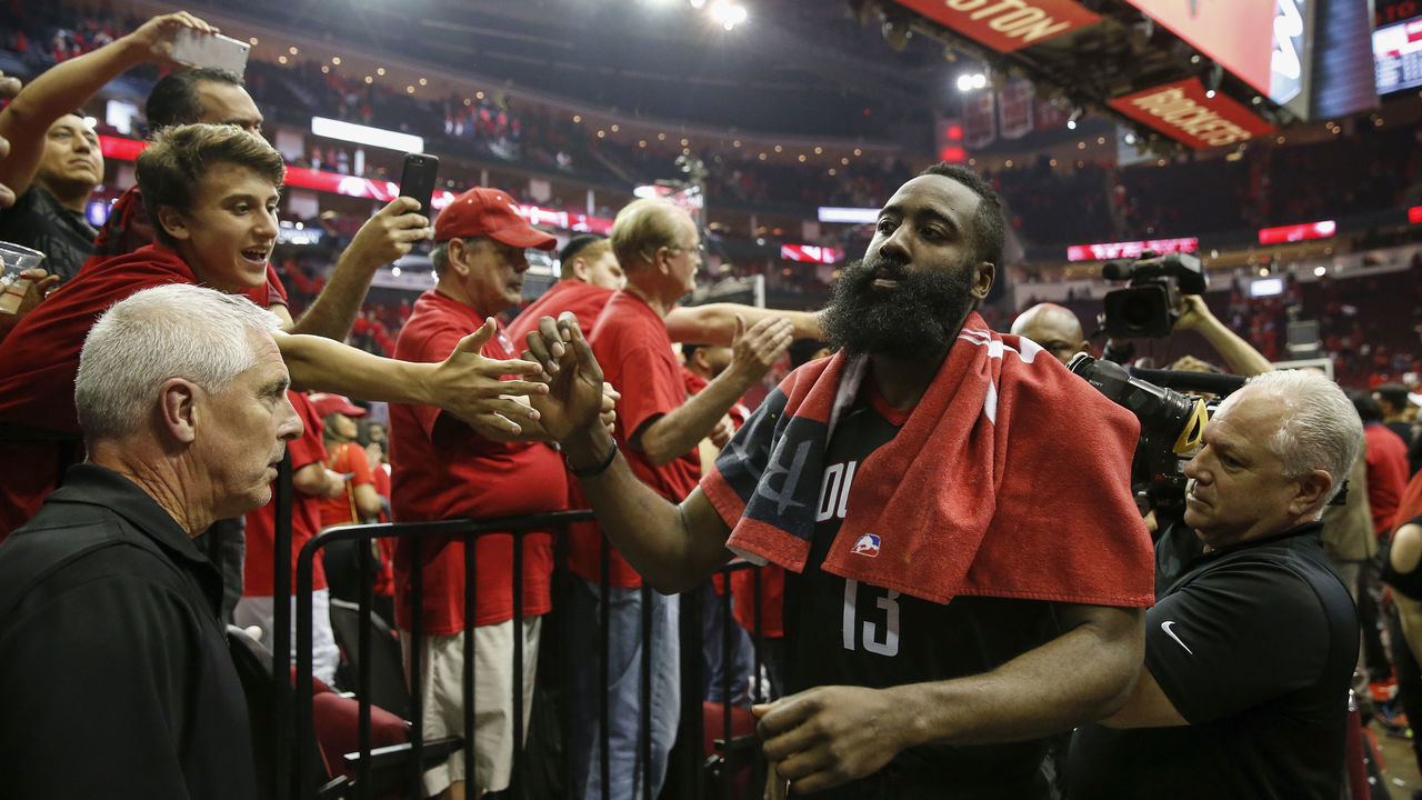 HOUSTON, TX - APRIL 25: James Harden #13 of the Houston Rockets celebrates with fans on his way to the locker room after Game Five of the first round of the 2018 NBA Playoffs against the Minnesota Timberwolves at Toyota Center on April 25, 2018 in Houston, Texas.
