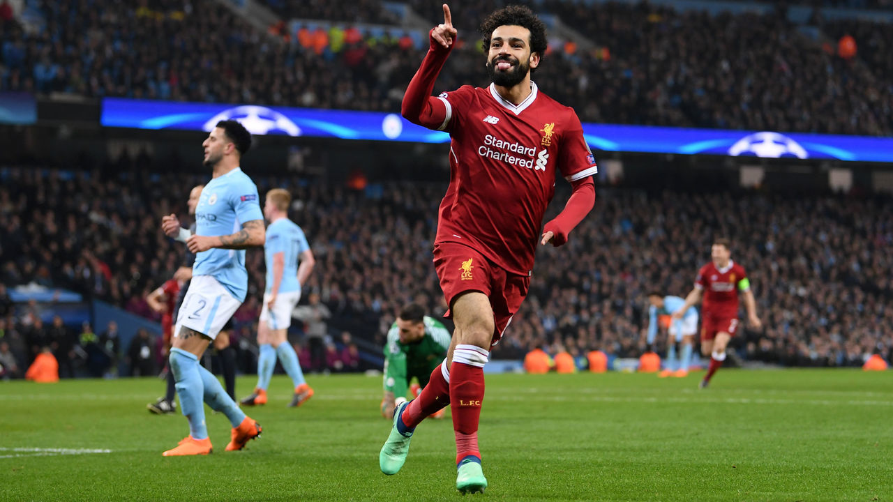 MANCHESTER, ENGLAND - APRIL 10: Mohamed Salah of Liverpool celebrates after scoring his sides first goal during the UEFA Champions League Quarter Final Second Leg match between Manchester City and Liverpool at Etihad Stadium on April 10, 2018 in Manchester, England.