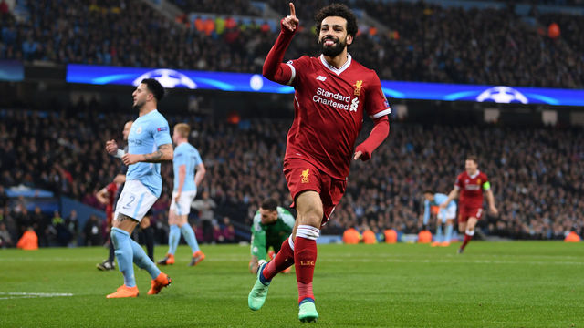 MANCHESTER, ENGLAND - APRIL 10: Mohamed Salah of Liverpool celebrates after scoring his sides first goal during the UEFA Champions League Quarter Final Second Leg match between Manchester City and Liverpool at Etihad Stadium on April 10, 2018 in Manchester, England.
