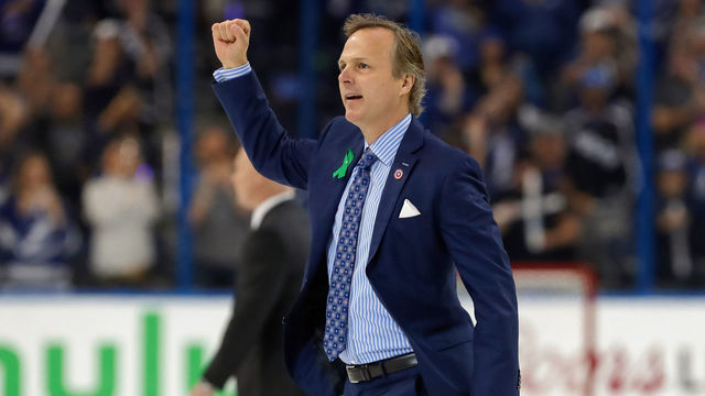 TAMPA, FL - APRIL 21: Head coach Jon Cooper of the Tampa Bay Lightning celebrates a series win over the New Jersey Devils after Game Five of the Eastern Conference First Round during the 2018 NHL Stanley Cup Playoffs at Amalie Arena on April 21, 2018 in Tampa, Florida.