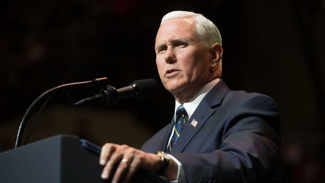 US Vice President Mike Pence introduces US President Donald Trump during a rally in Elkhart, Indiana, May 10, 2018.