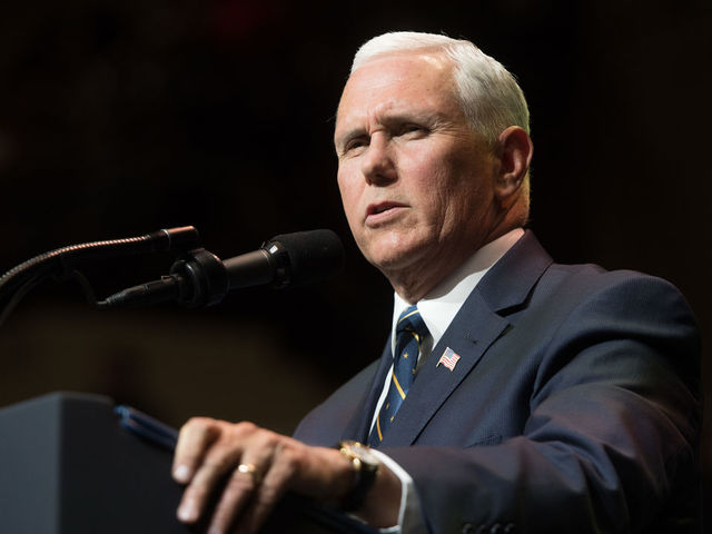 US Vice President Mike Pence introduces US President Donald Trump during a rally in Elkhart, Indiana, May 10, 2018.