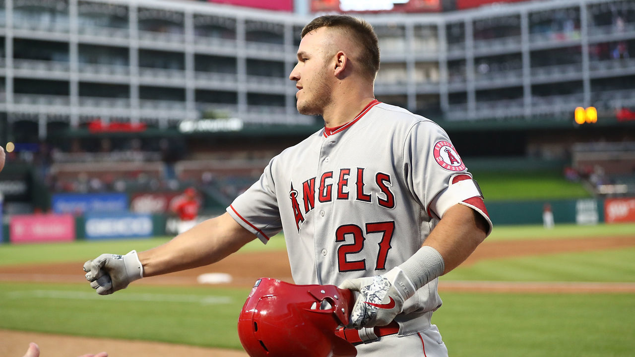 ARLINGTON, TX - APRIL 10: Mike Trout #27 of the Los Angeles Angels celebrates a homerun in the second inning against the Texas Rangers at Globe Life Park in Arlington on April 10, 2018 in Arlington, Texas.
