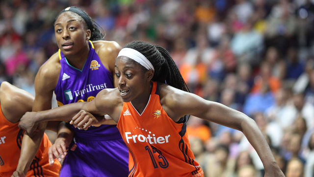UNCASVILLE, CONNECTICUT- JULY 15: Sisters Nneka Ogwumike #30 of the Los Angeles Sparks and Chiney Ogwumike #13 of the Connecticut Sun in action during the Los Angeles Sparks Vs Connecticut Sun, WNBA regular season game at Mohegan Sun Arena on July 15, 2016 in Uncasville, Connecticut.