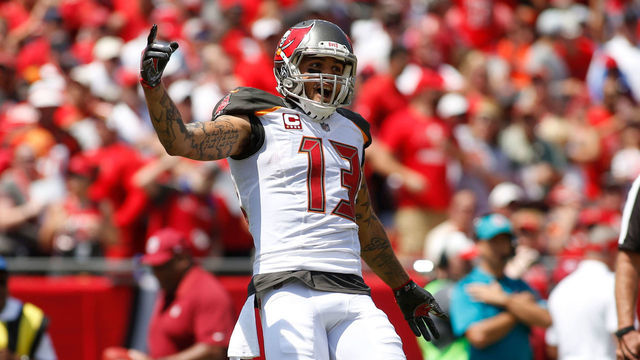 TAMPA, FL - SEPTEMBER 17: Wide receiver Mike Evans #13 of the Tampa Bay Buccaneers celebrates in the end zone after his 13-yard touchdown reception from quarterback Jameis Winston during the first quarter of an NFL football game on September 17, 2017 at Raymond James Stadium in Tampa, Florida.