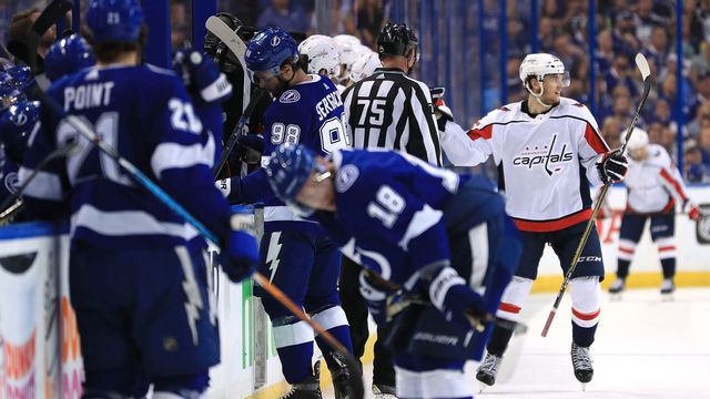 TAMPA, FL - MAY 23: Andre Burakovsky #65 of the Washington Capitals celebrates with his teammates after scoring his second goal on Andrei Vasilevskiy #88 of the Tampa Bay Lightning during the second period in Game Seven of the Eastern Conference Finals during the 2018 NHL Stanley Cup Playoffs at Amalie Arena on May 23, 2018 in Tampa, Florida.