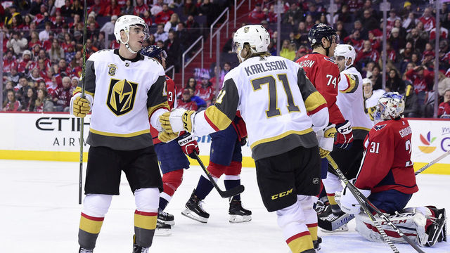 WASHINGTON, DC - FEBRUARY 04: Reilly Smith #19 of the Vegas Golden Knights celebrates with William Karlsson #71 after scoring a second period goal against the Washington Capitals at Capital One Arena on February 4, 2018 in Washington, DC.