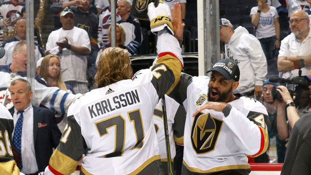 WINNIPEG, MB - MAY 20: William Karlsson #71 and Pierre-Edouard Bellemare #41 of the Vegas Golden Knights high five as they leave the ice following a 2-1 victory over the Winnipeg Jets in Game Five of the Western Conference Final during the 2018 NHL Stanley Cup Playoffs at the Bell MTS Place on May 20, 2018 in Winnipeg, Manitoba, Canada. The Knights win the series 4-1.
