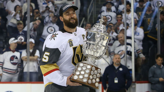 WINNIPEG, MB - MAY 20: Deryk Engelland #5 of the Vegas Golden Knights celebrates with the Clarence S. Campbell Bowl after defeating the Winnipeg Jets 2-1 in Game Five of the Western Conference Finals to advance to the 2018 NHL Stanley Cup Final at Bell MTS Place on May 20, 2018 in Winnipeg, Canada.